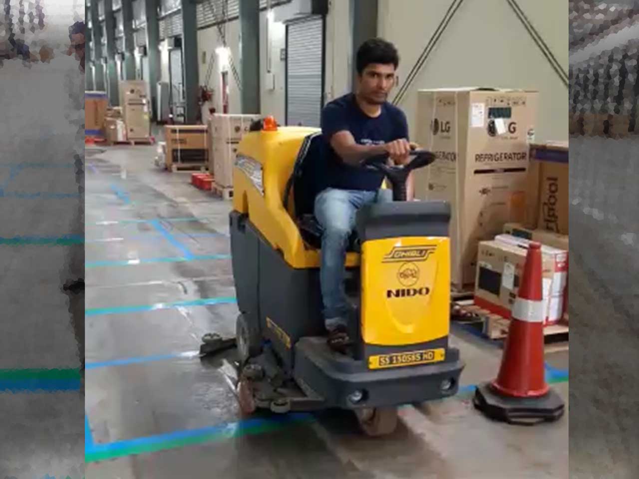 Ride On - Battery Sweeper with Collector- Industrial Cleaning at Warehouse
