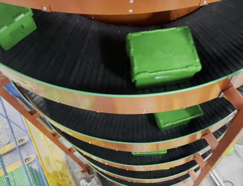 Vertical Conveying of Totes with CANOPUSVERT Motorized Spiral Conveyor